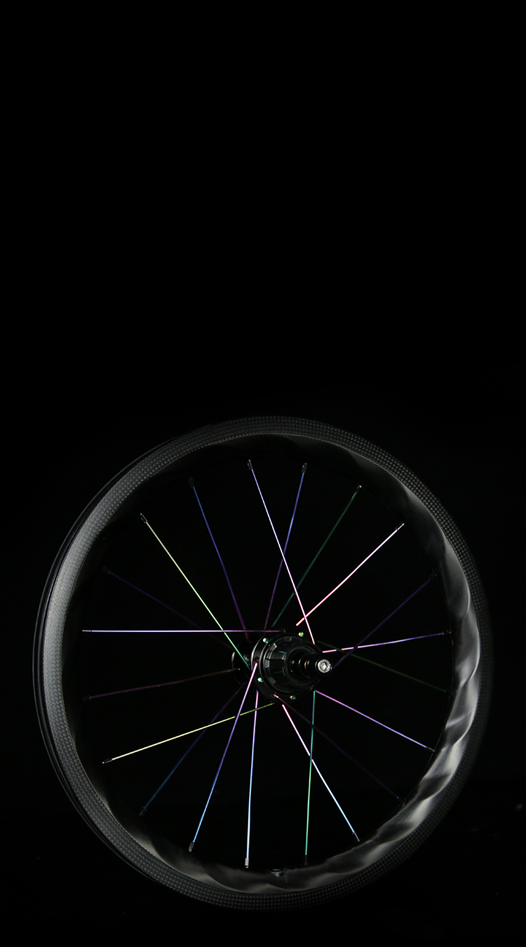 MO-Lightbicycle-brompton-rims-laced-with-oil-slick-spokes.jpeg